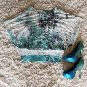 Gorgeous aqua/teal colored blouse.